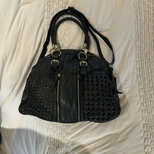 Yoki black shoulder/cross body purse with adjustable strap. Gently used